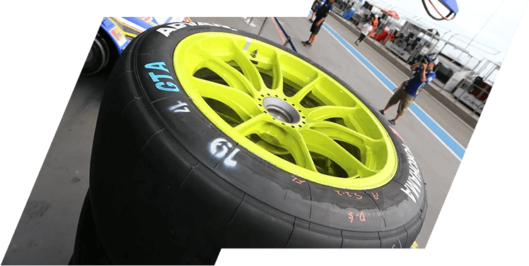 A close up of the tire on a race car