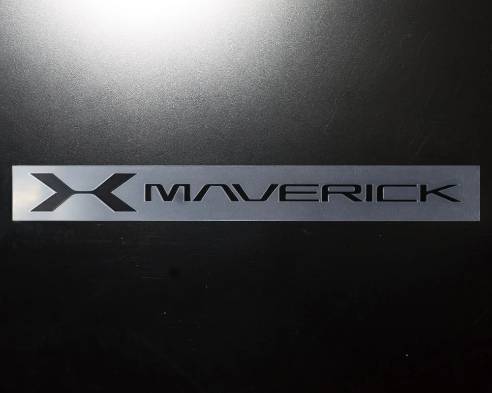 A black and white photo of the maverick logo.