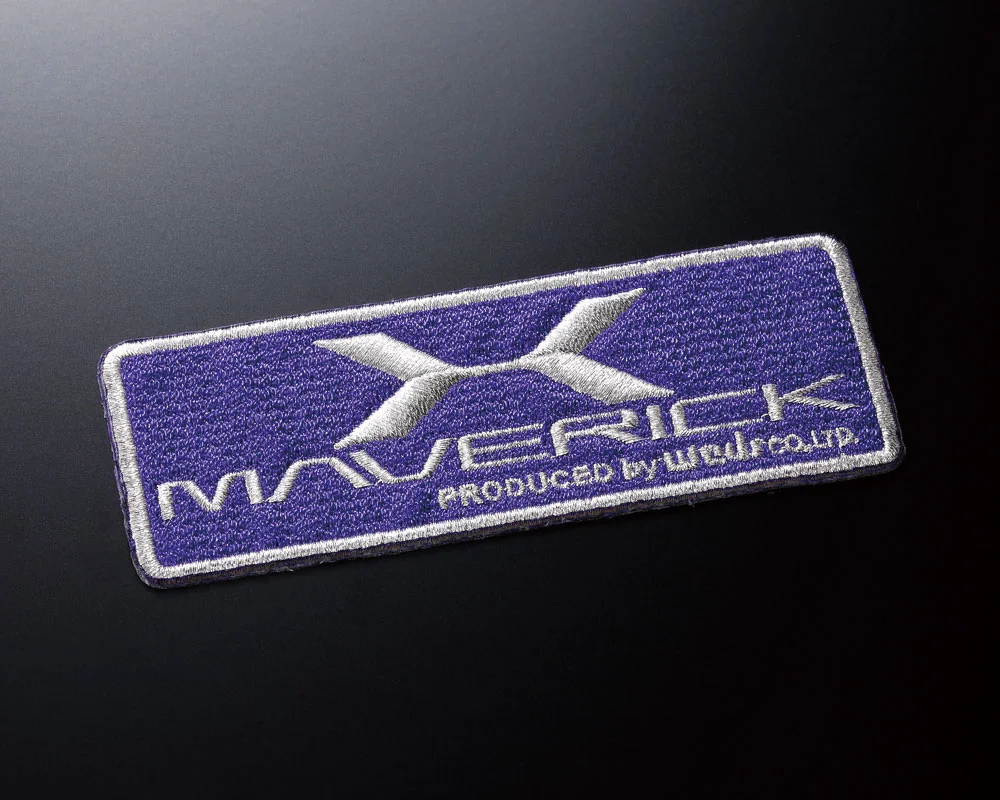 A purple patch with the word maverick on it.