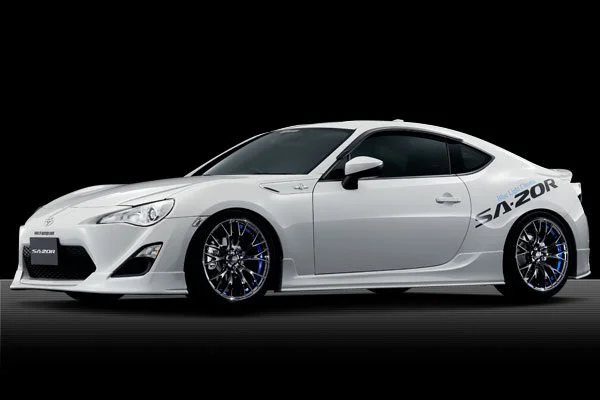 A white toyota 86 sports car on a black background.