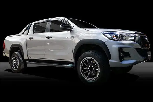 The 2019 toyota hilux is shown on a black background.