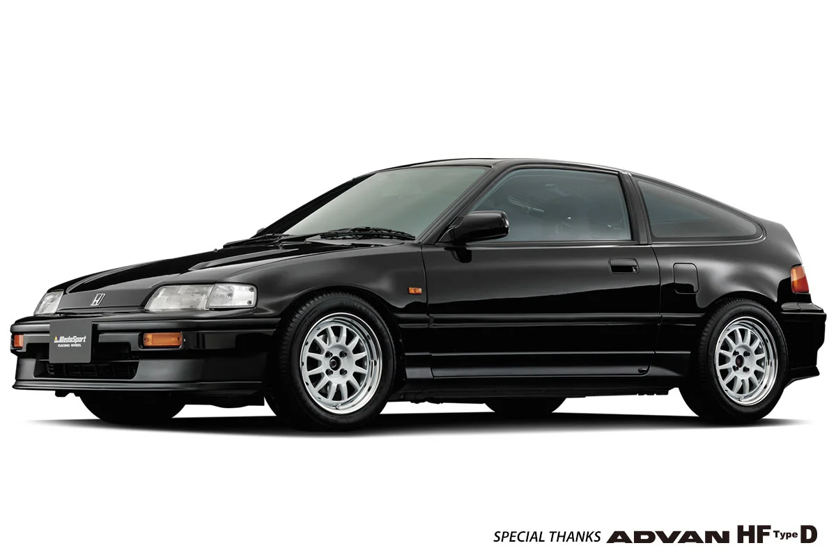 A black honda civic, enhanced with Weds Sport wheels, is shown on a white background.