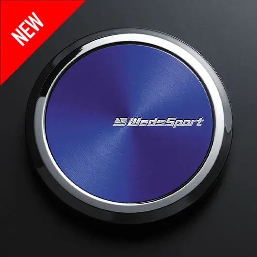 A blue button with the word'new'on it.